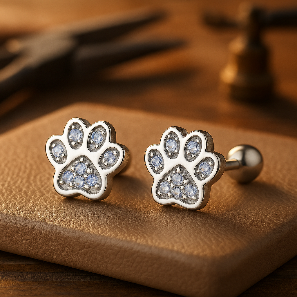 silver earrings with paw print